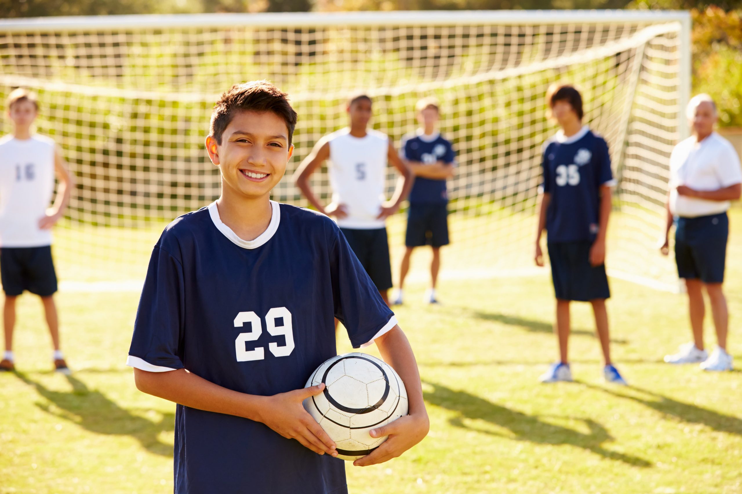 Child Playing Soccer